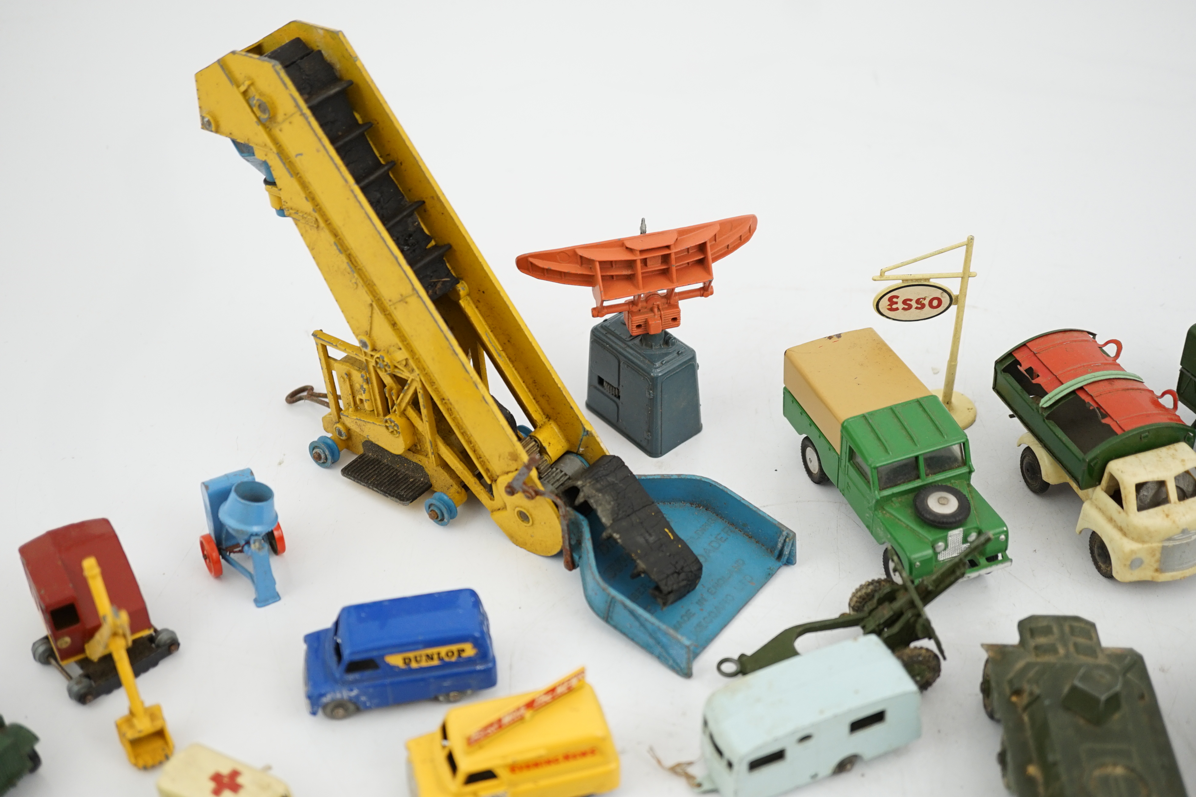 Thirty-eight diecast vehicles by Dinky Toys, Corgi Toys, Matchbox, etc. including a Spot-On BMW Isetta, military Dinky vehicles, Matchbox Series, etc.